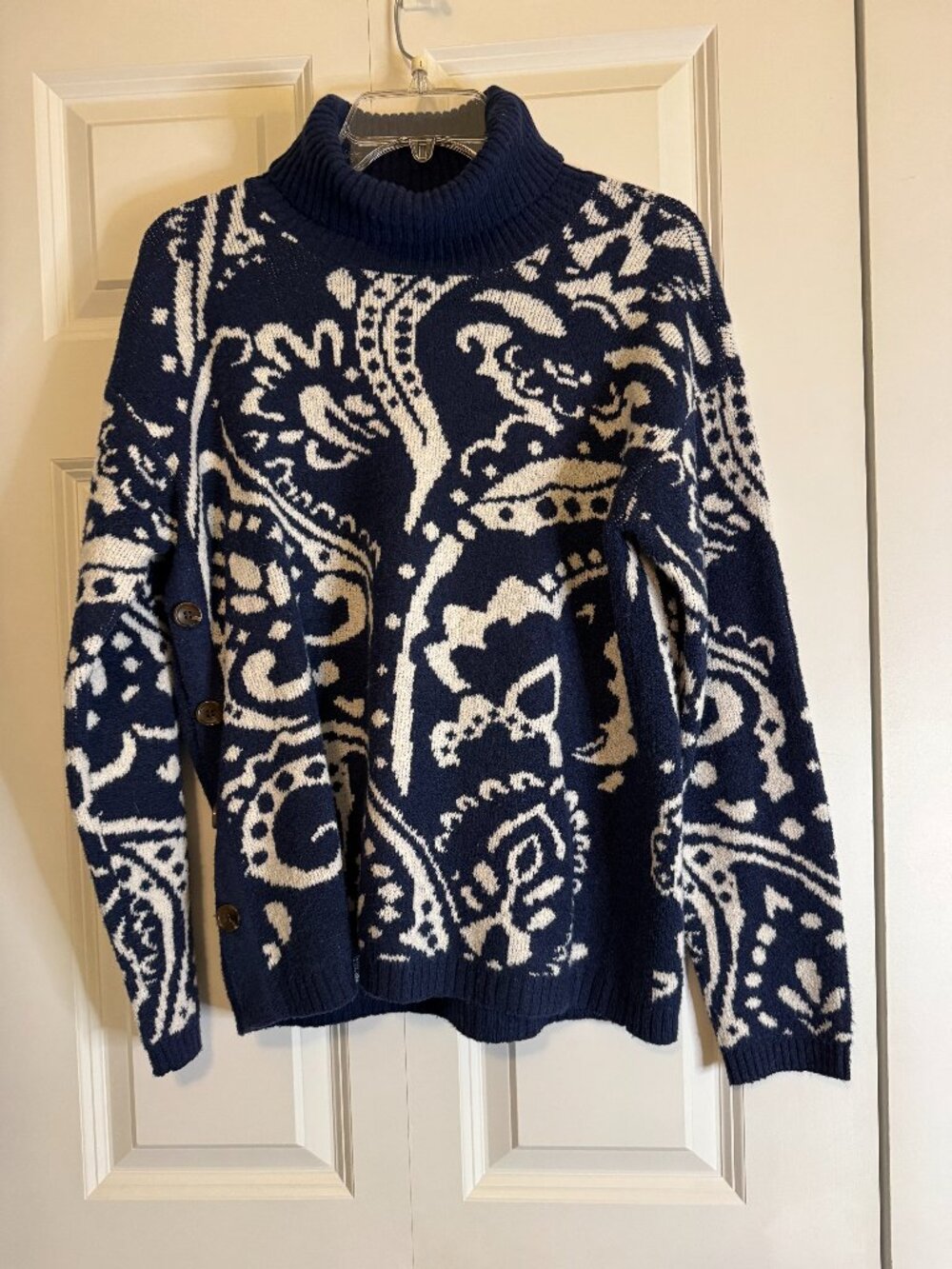 Navy floral turtleneck sweater with buttons